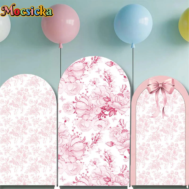 Fondo de arco personalizado rosa con lazo y flores, decoración para primer cumpleaños de niña, material spandex elástico, ideal para baby shower y fotografía de fiesta elegante.